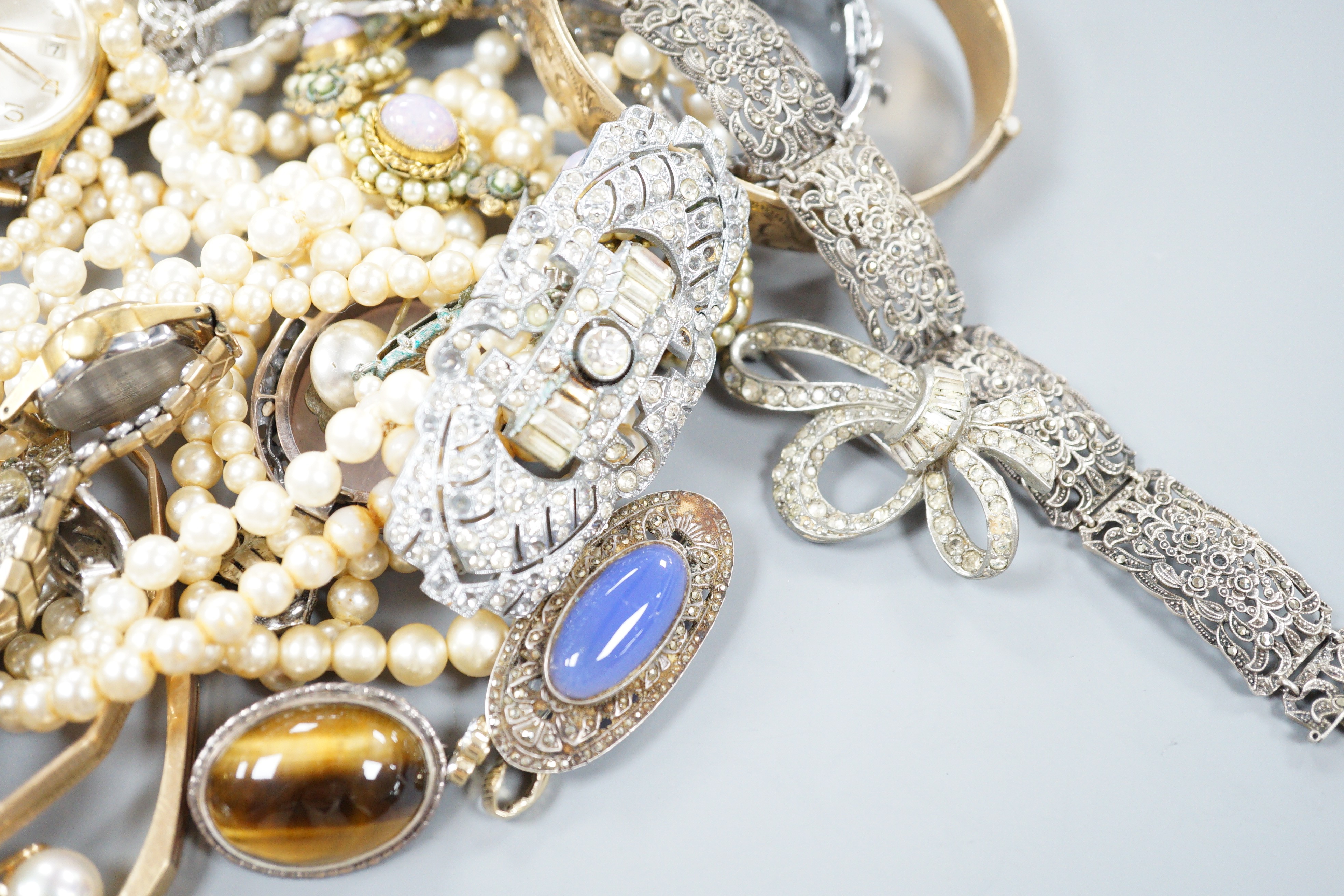 A quantity of assorted costume jewellery, including marcasite and three gentleman's wrist watches including a 9ct Record.